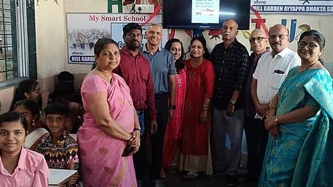 Hilgarden Ayyappa devotees donate smart TV to school