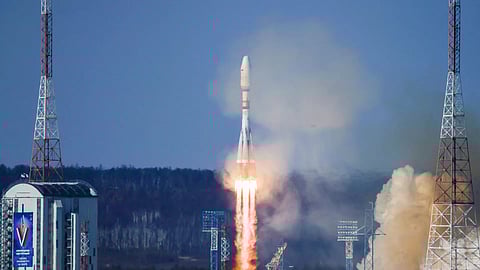 This handout image, taken and released by the Russian space agency Roscosmos on July 25, 2025, shows a rocket booster carrying several satellites, including an Iranian satellite, being launched from Far East Russia.