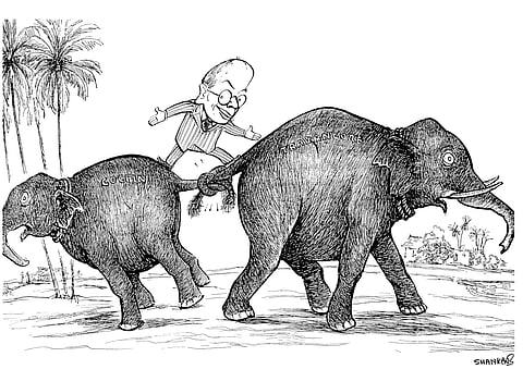 A cartoon drawn by famous cartoonist Shankar during the Travancore-Cochin merger. V.P. Menon, who led the merger, is on top of the elephants.