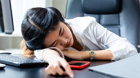 Woman takes five hours sleep at office to protest  low salary
