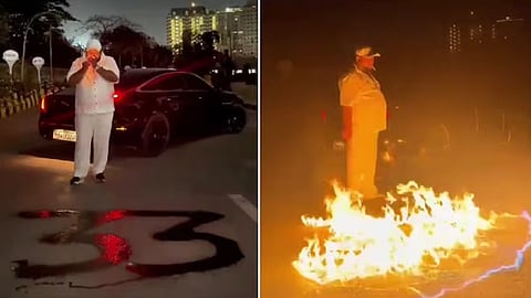 man sets part of road on fire with petrol in mumbai