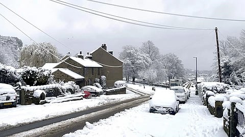 Schools shut, drivers stuck as gales and blizzards batter UK