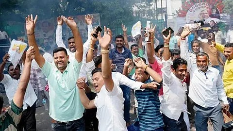 Celebrations break out outside Siddaramaiah's residence, at his native village