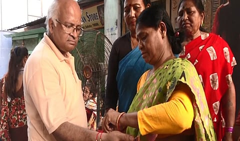 Sex workers in Kolkata's Sonagachi tie Rakhis to passers-by on Raksha Bandhan