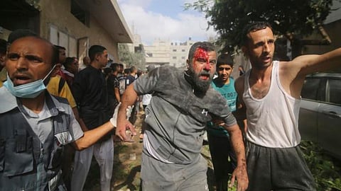 Israel ramps up strikes on Gaza as US advises delaying ground offensive to allow talks on captives