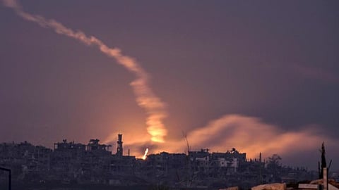 Warplanes strike Gaza refugee camp as Israel rejects US push for a pause in fighting