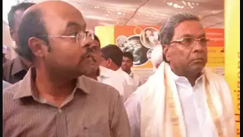 Dr Yathindra Siddaramaiah with his father