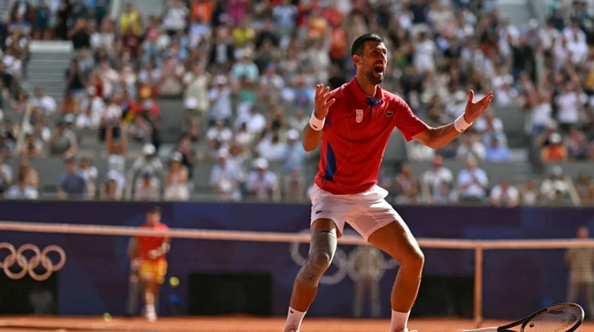 Novak Djokovic wins his first Olympic gold by beating Carlos Alcaraz in Novak Djokovic wins his first Olympic gold by beating Carlos Alcaraz in