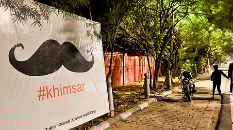 Mustache hoarding placed outside the residence of Rajasthan minister Gajendra Singh Khimsar after BJP won 5 seats in bypolls election, at Civil lines in Jaipur, Monday, Nov 25, 2024. 