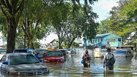 3 dead, over 80,000 displaced as Malaysia prepares for worst floods in decade 