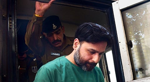 Former RTO constable Saurabh Sharma, an accused in a money laundering case, being produced before a court, in Bhopal, Tuesday, Feb. 11, 2025.