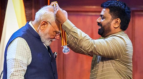 Prime Minister Narendra Modi being conferred with the 'Mithra Vibhushana' award by Sri Lankan President Anura Kumara Dissanayake during a ceremony at the presidential secretariat, in Colombo, Sri Lanka on Saturday, April 5, 2025, 