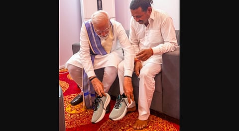 Prime Minister Narendra Modi meets Rampal Kashyap from Kaithal.