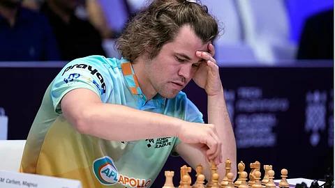 Magnus Carlsen is forced into a draw by ''the world.''