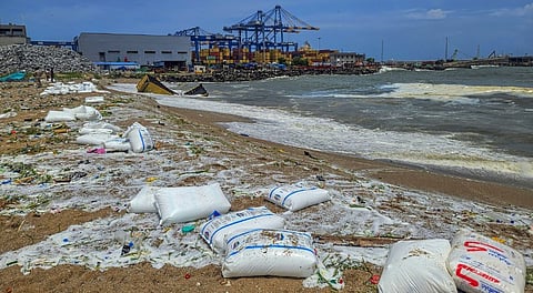 Cargo consignments from MLC ELSA 3, a Liberian ship that capsized at Kochi outer harbour, washed ashore on the Kerala coast, Wednesday, May 28, 2025