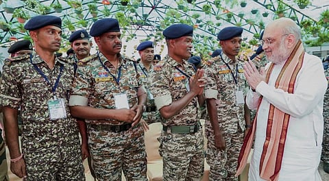 on June 23, 2025, Union Home Minister Amit Shah interacts with security personnel engaged in anti-Naxal operations, in Nawa Raipur, Chhattisgarh.