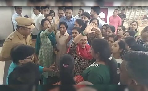 It sparked an outrage among the girls' parents, who protested on the school premises on Wednesday and sought action against its management and teachers involved in the episode