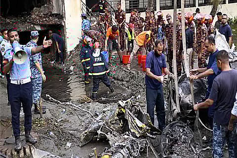Grief, angst continues as toll in jet crash on school rises to 32 in Bangladesh  