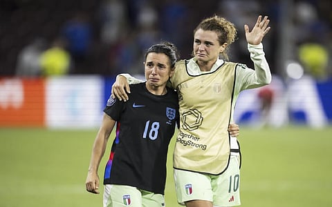 Italy captain Cristiana Girelli and defender Lucia Di Guglielmo cried  as they walked around the field after an emotional semifinal loss — 2-1 