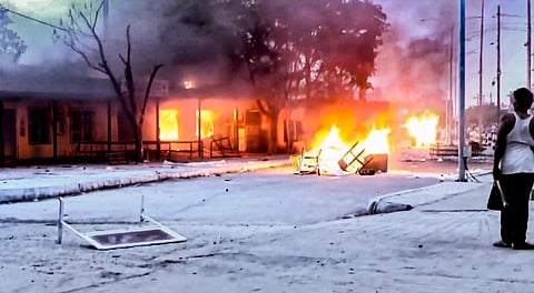 Smoke and flames billow out after a property and several structures were set on fire by agitators in the wake of anti-government protests in Nepal, near India-Nepal border, in Maharajganj district of UP, Wednesday, Sept. 10, 2025.