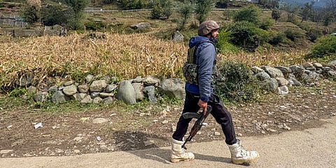 A security officer during a search operation to track down terrorists, at Kokernag in Anantnag district, Jammu and Kashmir, Wednesday, Oct. 8, 2025.