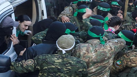 Israel says Hamas hands over the first seven hostages to the Red Cross