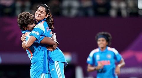 India's Radha Yadav, right, celebrates with Arundhati Reddy after taking the wicket of Bangladesh's Rabeya Khan during an ICC Women's World Cup 2025 ODI cricket match between India Women and Bangladesh Women, at DY Patil Stadium, in Navi Mumbai, Sunday, Oct. 26, 2025