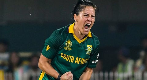 South Africa's Marizanne Kapp celebrates the wicket of England�s Amy Jones during an ICC Women's World Cup One-Day international (ODI) cricket match between England Women and South Africa Women, at ACA Stadium, Barsapara, in Guwahati, Assam, Wednesday, Oct. 29, 2025.