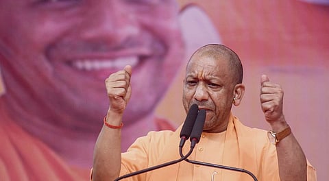 Uttar Pradesh Chief Minister Yogi Adityanath addresses a rally in support of BJP Digha Assembly Constituency candidate Sanjeev Chaurasia, unseen, in Patna, Monday, Nov. 3, 2025. 
