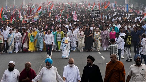 West Bengal Chief Minister and TMC supremo Mamata Banerjee with the party's General Secretary and MP Abhishek Banerjee and other party leaders takes part in a protest rally against the Special Intensive Revision (SIR) of electoral rolls in the state, in Kolkata, Tuesday, Nov. 4, 2025.