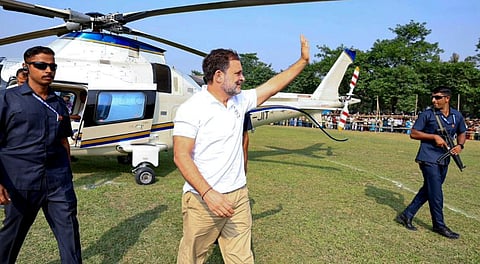 Leader of Opposition in the Lok Sabha and Congress leader Rahul Gandhi greets supporters as he arrives to address a public meeting at Kasba, in Purnia district, Bihar on Nov. 6, 2025.