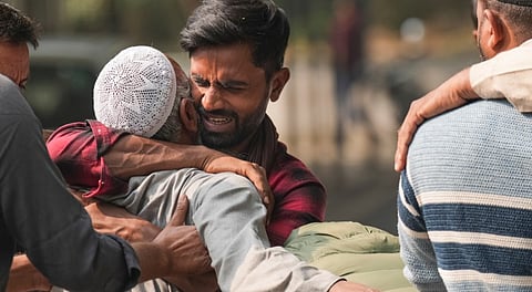 Relatives of Nouman, who died in the blast near Red Fort, mourn, outside a mortuary at Maulana Azad Medical College, New Delhi, Tuesday, Nov. 11, 2025. 