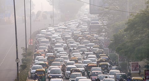 Vehicles move amid a traffic congestion during smog, at ITO, in New Delhi, Wednesday, Nov. 12, 2025. Air pollution in the national capital was recorded in the "severe" category on Wednesday morning for the second consecutive day.