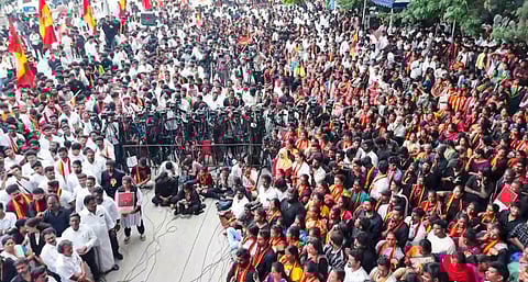 Tamilaga Vettri Kazhagam (TVK) supporters take part in a protest against the ongoing special intensive revision (SIR) of electoral rolls in Tamil Nadu, in Chennai, Sunday, Nov. 16, 2025. 