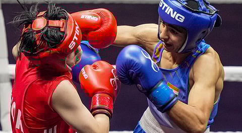 India's Preeti fights Chinese Taipei's Huang Hsiao-wen in women's 54kg semi-final match at the World Boxing Cup Finals 2025, in Greater Noida, Uttar Pradesh, Tuesday, Nov. 18, 2025.