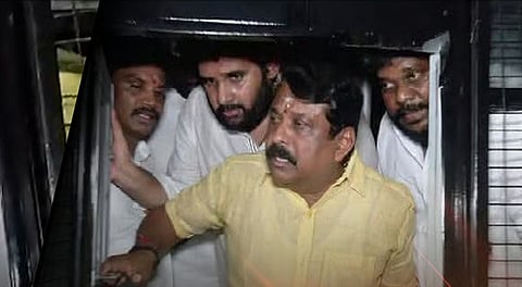 Nainar Nagenthran removed in police vehicle from Thirupparankundram hill top.