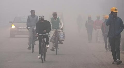 Daytime visibility in Delhi is reduced due to high concentrations of airborne particles.