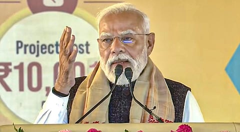 Prime Minister Narendra Modi addresses the gathering during the foundation stone laying of a Rs 10,601-crore brownfield ammonia-urea plant of Assam Valley Fertiliser and Chemical Company Ltd (AVFCCL), at Namrup, in Dibrugarh district, Assam.