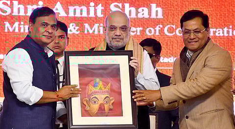 Union Home Minister Amit Shah being felicitated by Union Minister of Minister of Ports Sarbananda Sonowal and Assam Chief Minister Himanta Biswa Sarma during the inauguration of Batadrava Than, the birthplace of Vaishnavite saint Srimanta Sankardeva, in Nagaon, Monday, Dec. 29, 2025.