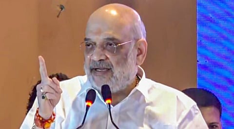 Union Home Minister Amit Shah vows BJP government in Kerala to counter 'anti-national' forces, slams UDF-LDF on development, at Mission 2026 launch, in Thiruvananthapuram, Sunday, Jan. 11, 2026