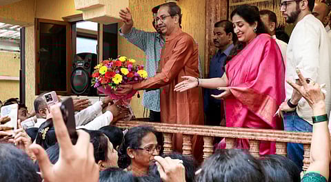 Shiv Sena (UBT) chief Uddhav Thackeray meets with winning candidates from his party at his residence in Bandra East, accompanied by son Aaditya Thackeray and wife Rashmi Thackeray, following the Brihanmumbai Municipal Corporation (BMC) election results, in Mumbai, Saturday, Jan. 17, 2026.