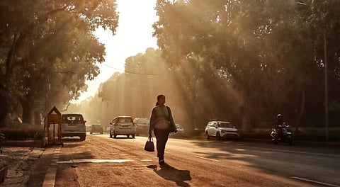 Commuters make their way during a smoggy winter morning, in New Delhi, Tuesday, Jan. 20, 2026. Delhi's three-day run of 'severe' air pollution ended on Tuesday morning, with the city's average Air Quality Index (AQI) showing a marginal improvement and settling in the 'very poor' category at 395.
