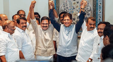 on Jan. 21, 2026, Union Minister Piyush Goyal, centre, raises hands with Amma Makkal Munnetra Kazhagam (AMMK) President TTV Dhinakaran as he joins the NDA alliance, in the presence of Minister of State L Murugan, BJP National Women's Wing President Vanathi Srinivasan, MLA M R Gandhi and BJP leader Nainar Nagenthran, in Chennai. 