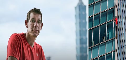 American rock climber Alex Honnold climbs Taipei 101 skyscraper without ropes