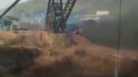 Smoke billows after an explosion at an illegal coal mine, in East Jaintia Hills district, Meghalaya, Thursday, Feb. 5, 2026.