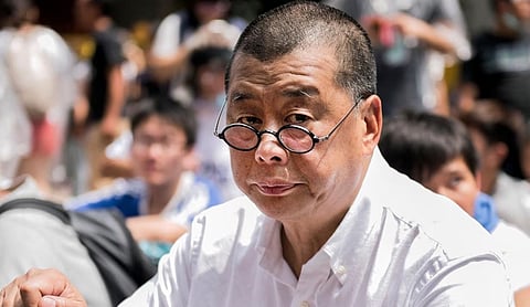 Hong Kong ex-media tycoon Jimmy Lai sentenced to 20 years in prison in national security case