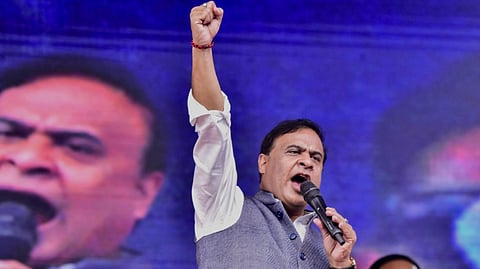 Assam Chief Minister Himanta Biswa Sarma addresses a public gathering during the ceremonial distribution of financial assistance under Chief Minister's Atmanirbhar Asom Abhijan 2.0 scheme, in Nagaon, Sunday, Feb. 15, 2026.