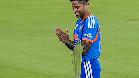 India's captain Suryakumar Yadav poses for a picture with trophy on the eve of the ICC Men's T20 World Cup 2026 final cricket match between India and New Zealand, at the Narendra Modi Stadium, in Ahmedabad, Gujarat, Saturday, March 7, 2026.
