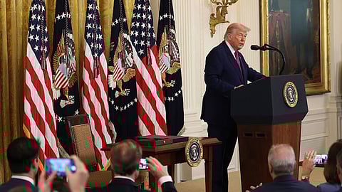 Iran state TV says Trump backed down after firm warning