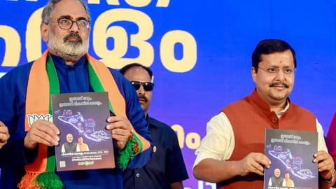 BJP National President Nitin Nabin, right, and the party's Kerala President Rajeev Chandrasekhar during the release of NDA's election manifesto for the upcoming state Assembly polls, in Thiruvananthapuram, Kerala, Tuesday, March 31, 2026.